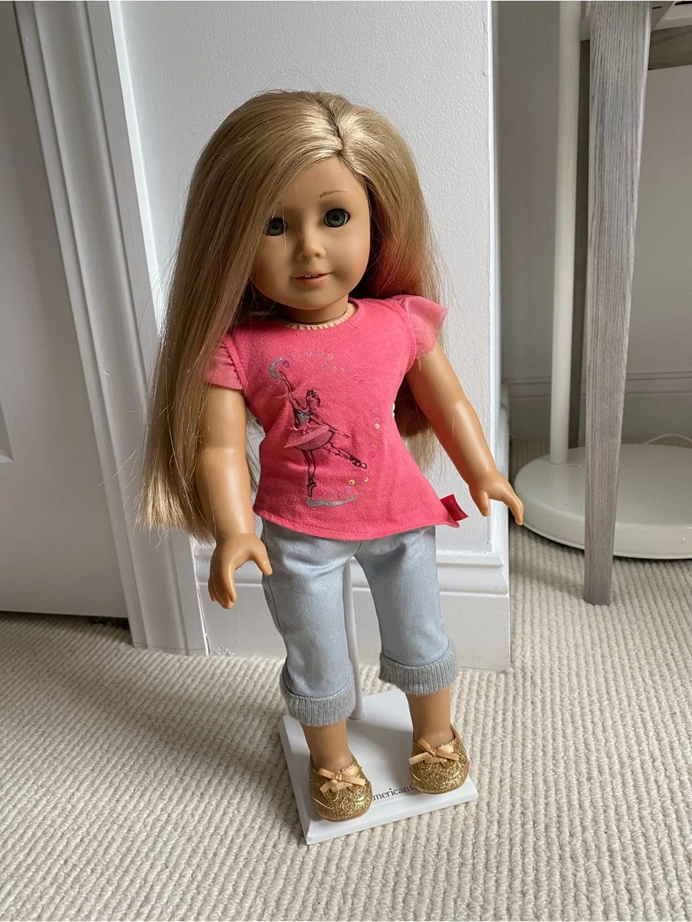 American Girl Isabelle doll with three outfits, ballet bar and two stands.